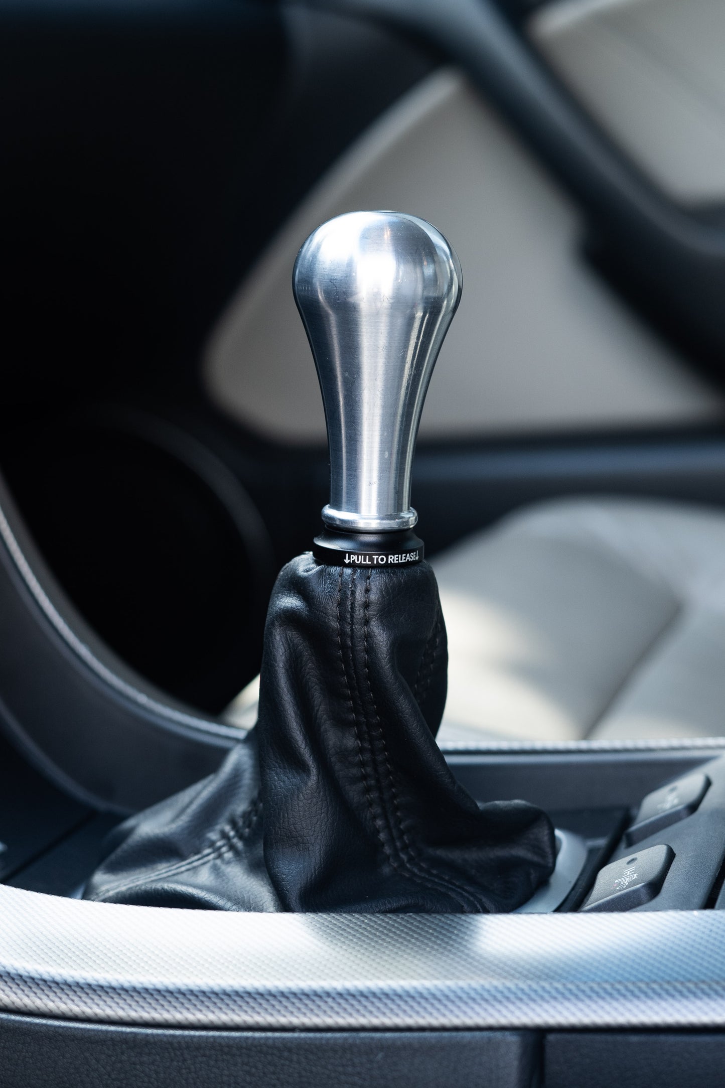Honda shift boot collar installed with aftermarket shift knob
